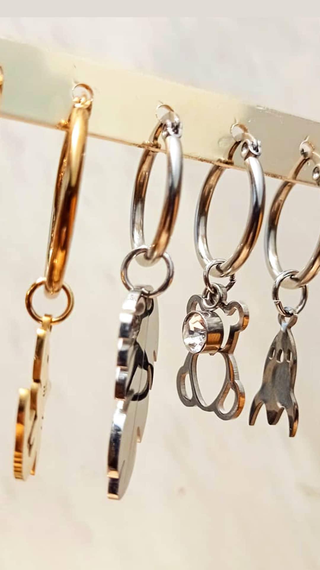 Mono orecchini ciondoli charms